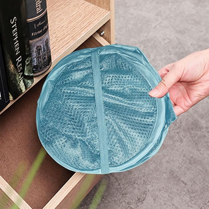 The upgraded pop-up laundry basket features a breathable side pocket mesh design