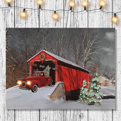 BANBERRY DESIGNS LED Wall Art - Lighted Red Truck Covered Bridge Canvas Print - Christmas Picture with LED and Fiber Optic Lights - Winter Scene Wall Art - Measures 11.75" X 15.75"