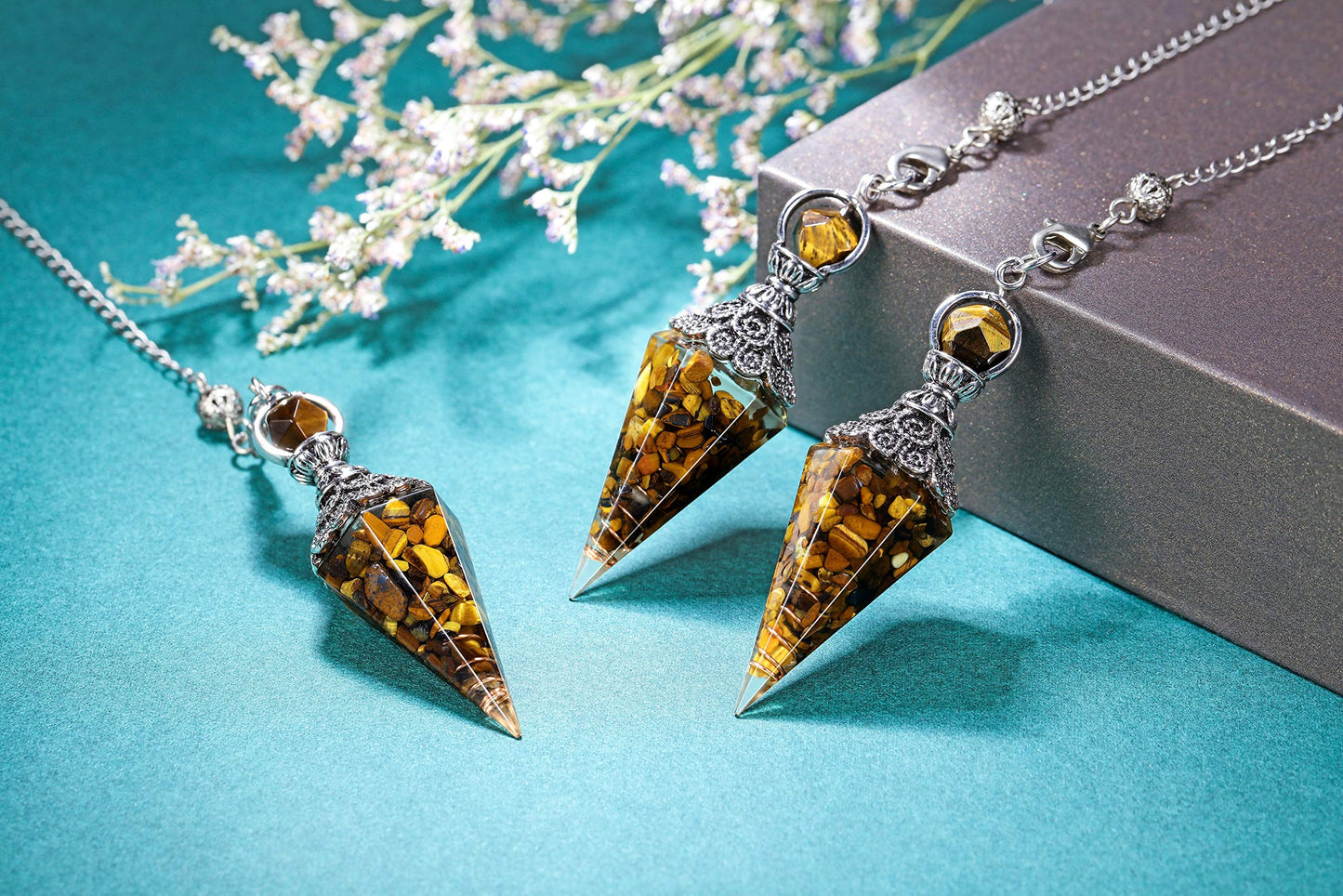 GEHECRST Natural Tiger Eye Healing Crystal Dowsing Pendulum Reiki Gemstone Chips Orgone Pendulum 6 Faceted Hexagonal Pointed Resin Spiritual Pendant for Divination, Wicca, Energy Balancing