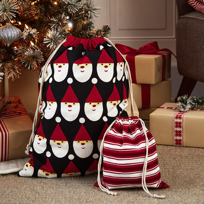 Hallmark Drawstring Christmas Gift Bag Set (2 Fabric Bags with Drawstrings; 1 Medium 10", 1 Extra Large 20") Santa, Red and White Stripe, 5XGB4902