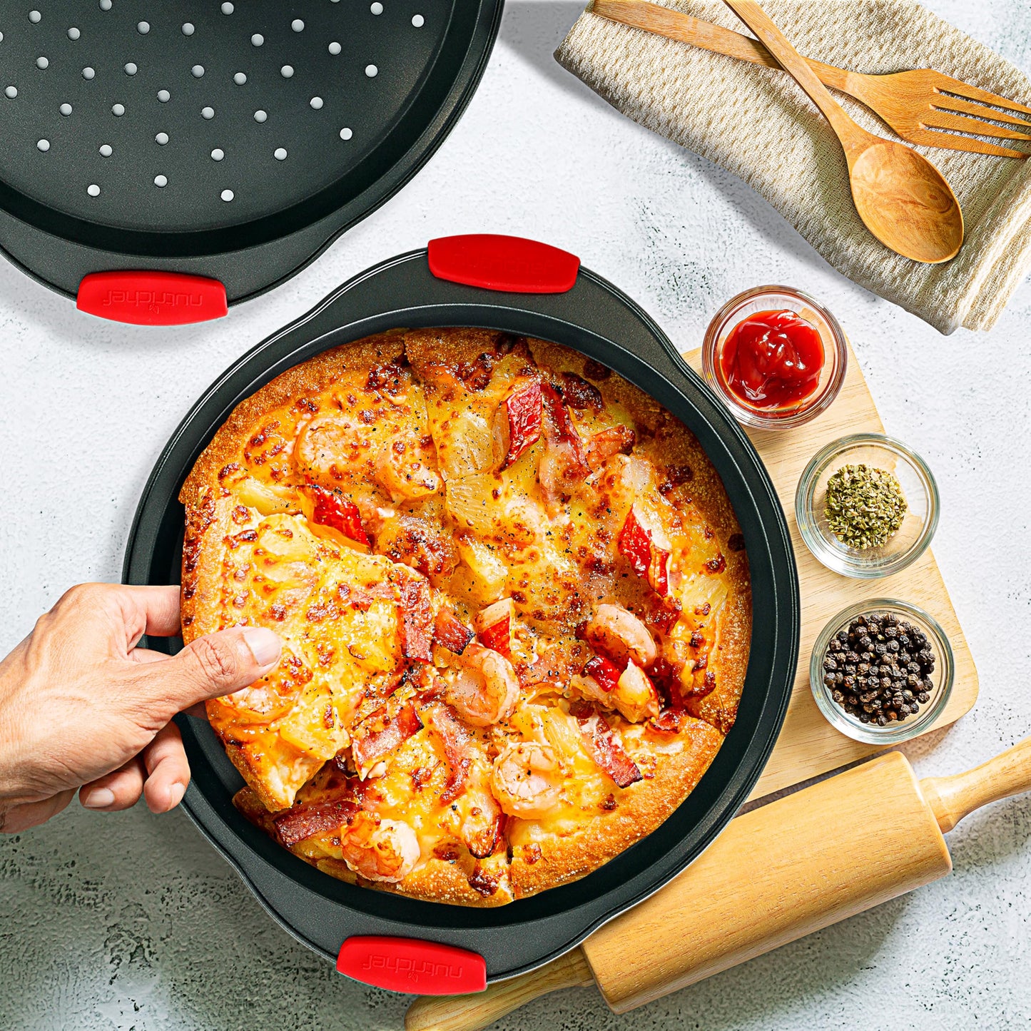 NutriChef 2-Pc. Non Stick Pizza Tray - with Silicone Handle, Round Steel Non-Stick Pan with Perforated Holes, Dishwasher Safe, Pizza Tray with Silicone and Oversized Handle, PFOA, PFOS, PTFE Free